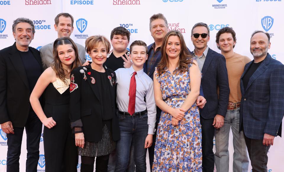 (L-R) Chuck Lorre, Matt Hobby, Raegan Revord, Annie Potts, Wyatt McClure, Iain Armitage, Lance Barber, Zoe Perry, Steve Holland, Montana Jordan and Steven Molaro at the 100th episode premiere of Young Sheldon at Warner Bros. Studios. in March 2022.