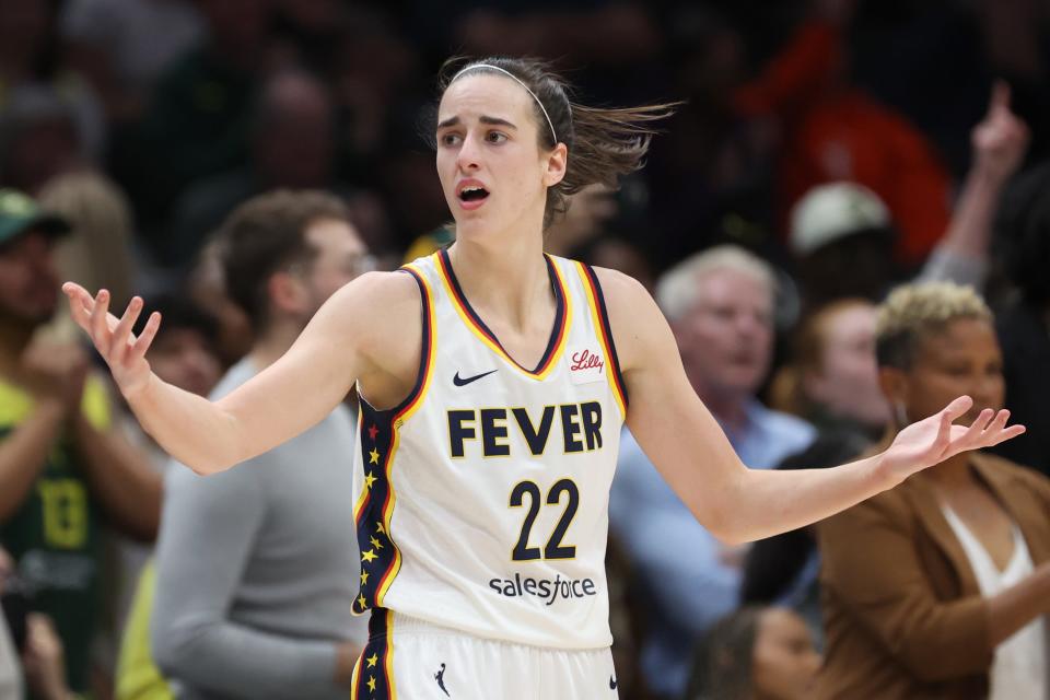 Caitlin Clark reacts during the fourth quarter of the Indiana Fever's game against the Seattle Storm.