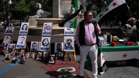 French court sentences 3 Syrian officials to life in prison in absentia for war crimes