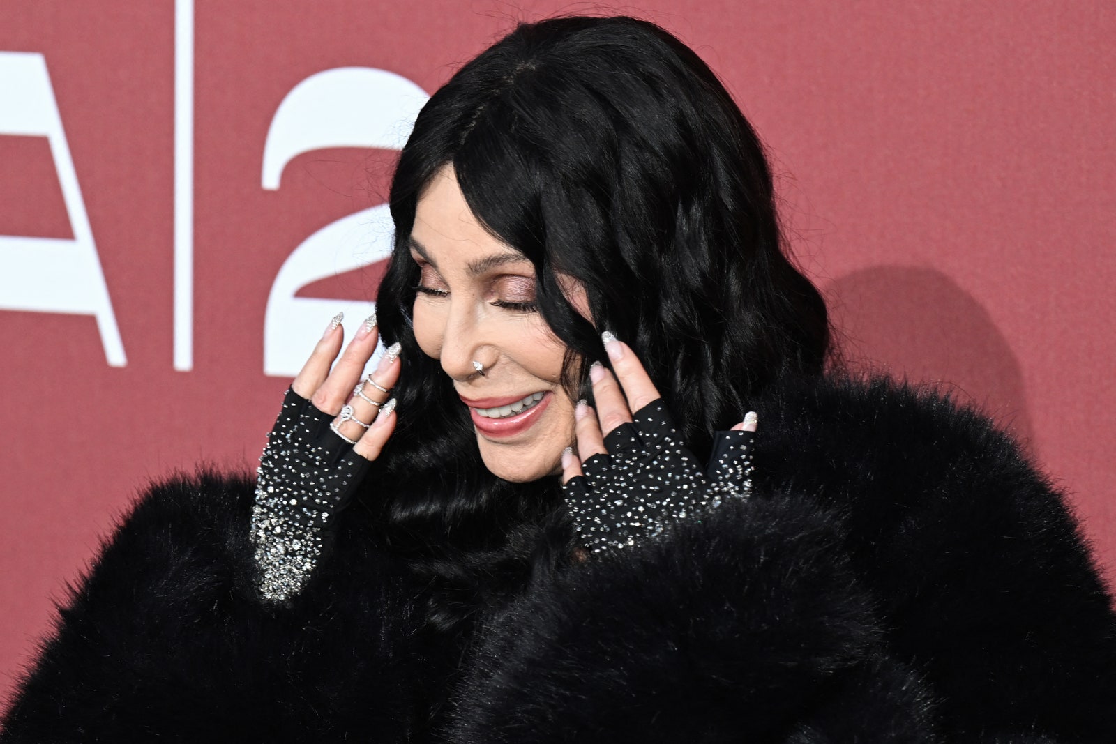 US singer Cher arrives to attend the annual amfAR Cinema Against AIDS Cannes Gala at the Hotel du CapEdenRoc in Cap...