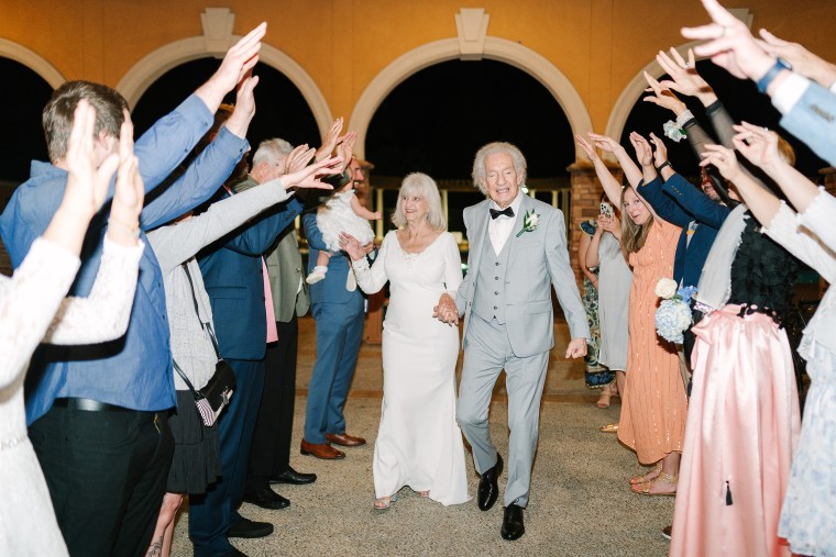 The newlyweds celebrate with their family.