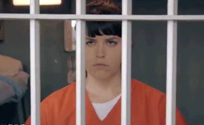 a person behind bars