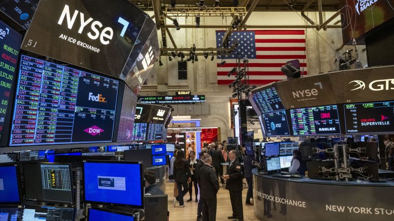Dow closes above 40,000 for first time ever