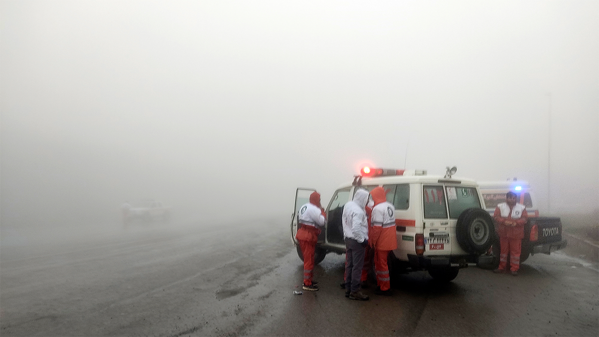 Rescue teams are seen near the site of the incident of the helicopter carrying Iranian President Ebrahim Raisi