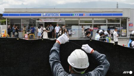 Holes poked in Mount Fuji barrier, Japan town says