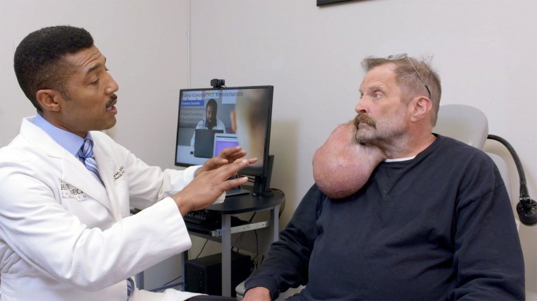 Dr. Ryan F. Osborne with a patient.
