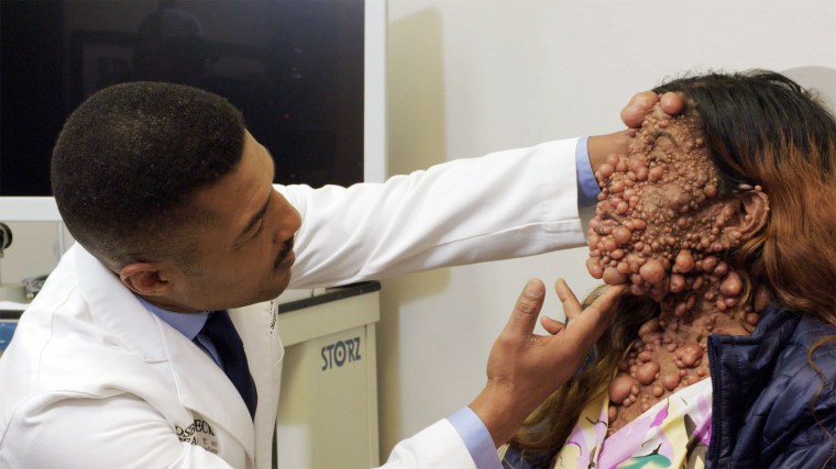 Dr. Ryan F. Osborne with a patient.