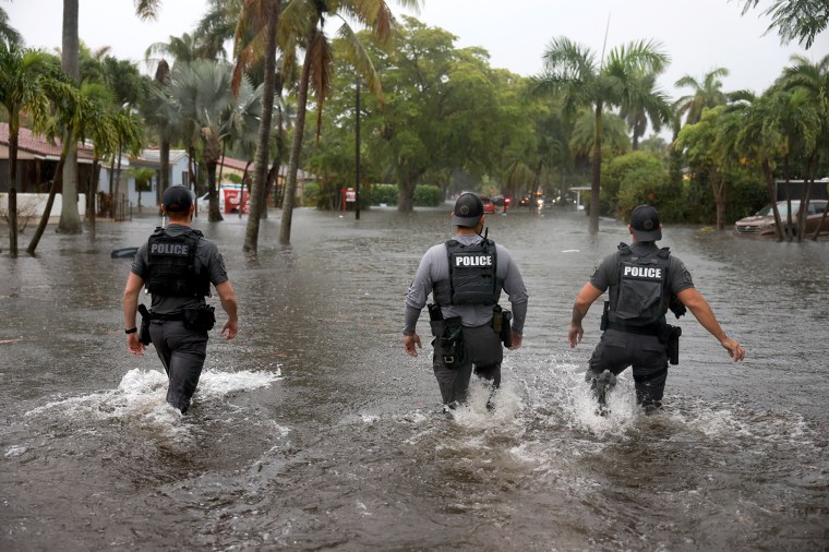 Image: Rain Storms Inundate Southern Florida search rescue