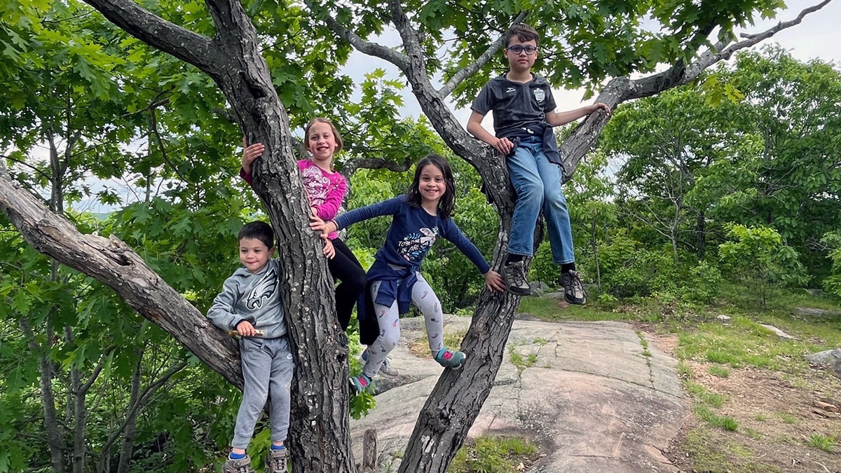 Lucy with her three siblings while in vacation in Maine