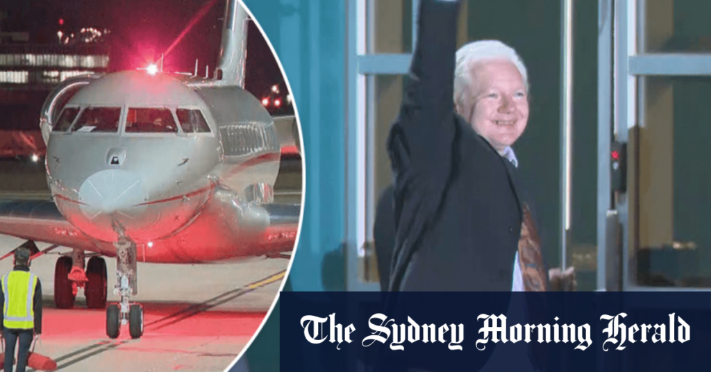 Julian Assange arrives in Australia