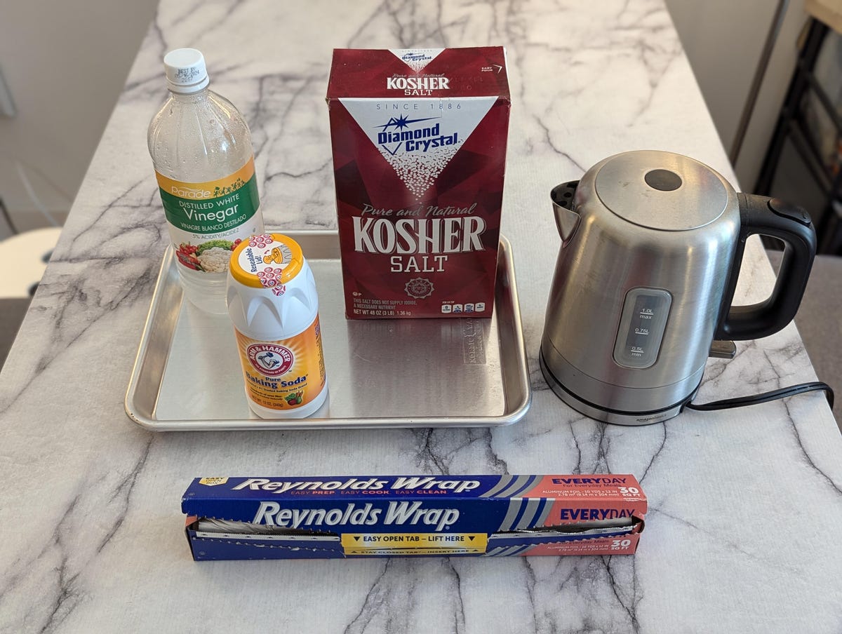 deep cleaning supplies for silverware on table