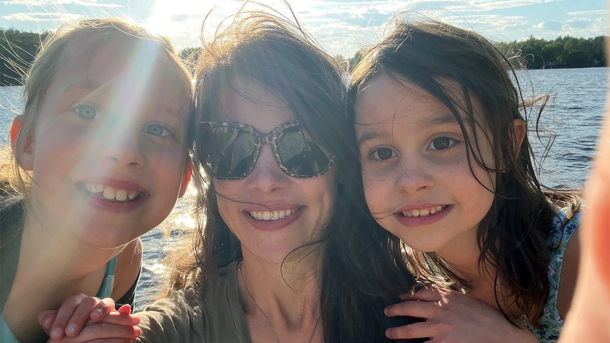Lucy and her mother, Bethany, and sister.
