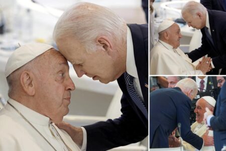 Biden embraces surprised-looking Pope Francis with forehead-to-forehead hug at G7 summit
