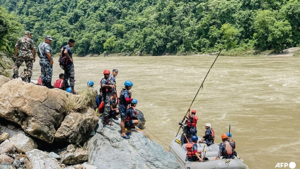 Nepal recovers first body from buses swept away by landslide