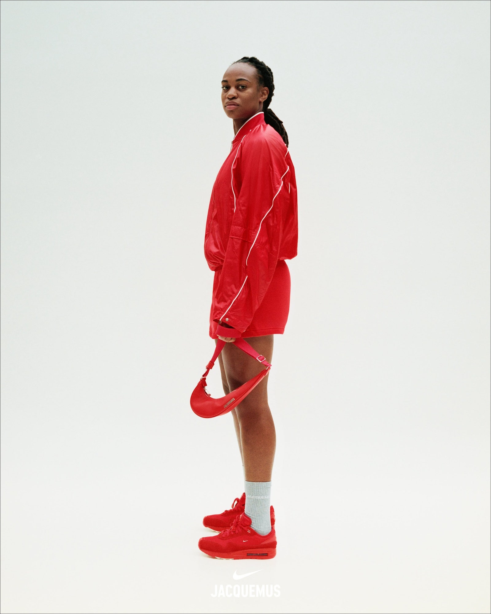 Image may contain Clothing Coat Footwear Shoe Person and Raincoat