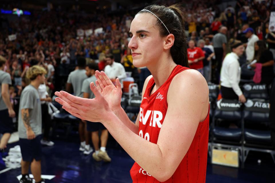 Caitlin Clark of the Indiana Fever celebrates after the game against the Minnesota Lynx at Target Center on July 14, 2024 in Minneapolis, Minnesota.