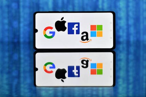 Microsoft Vs. Apple Vs. Google: Which AI Stock Is A Buy Ahead Of Earnings?