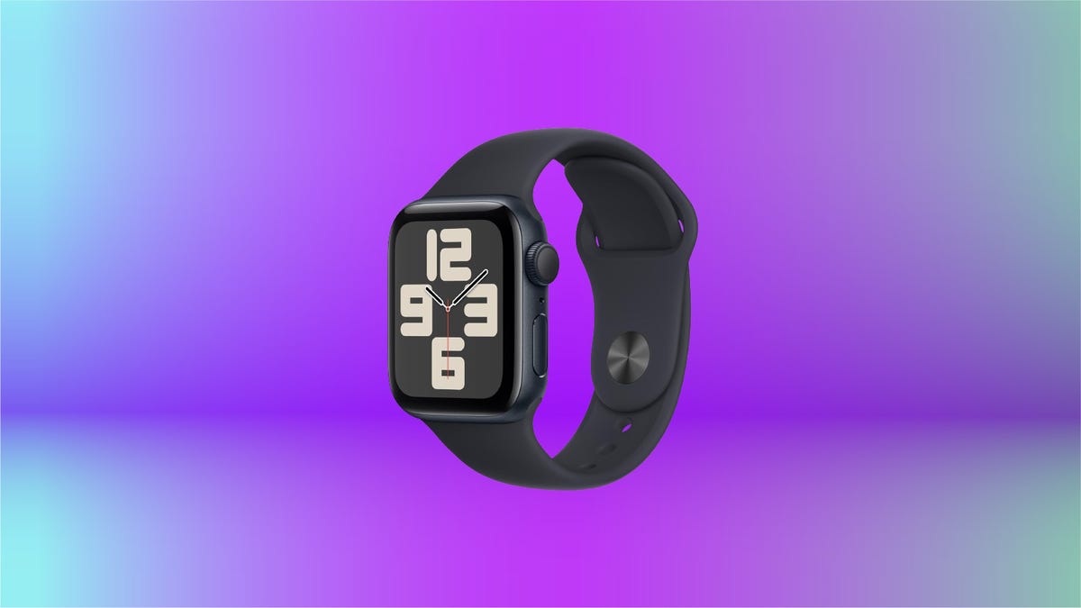 Apple Watch SE on display against purple gradient background.