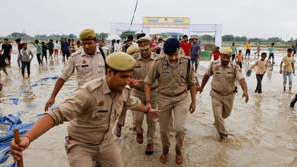 Devotees surged towards preacher moments before lethal India crush, witnesses say