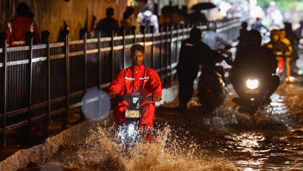 Monsoon rains bring floods, disrupting transport, in India’s Mumbai