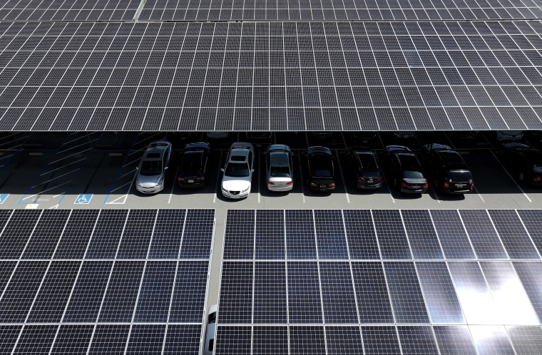 California Cuts Back On Rooftop Solar Incentives As State Struggles To Offload Excess Power solar panels parking lot