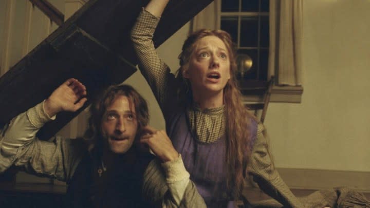 Two people try to hide in The Village.