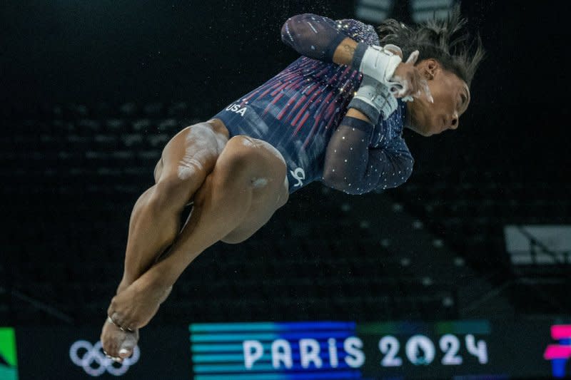 Team USA's Simone Biles performs during uneven bars practice Thursday at Bercy Arena in Paris. Photo by Pat Benic/UPI