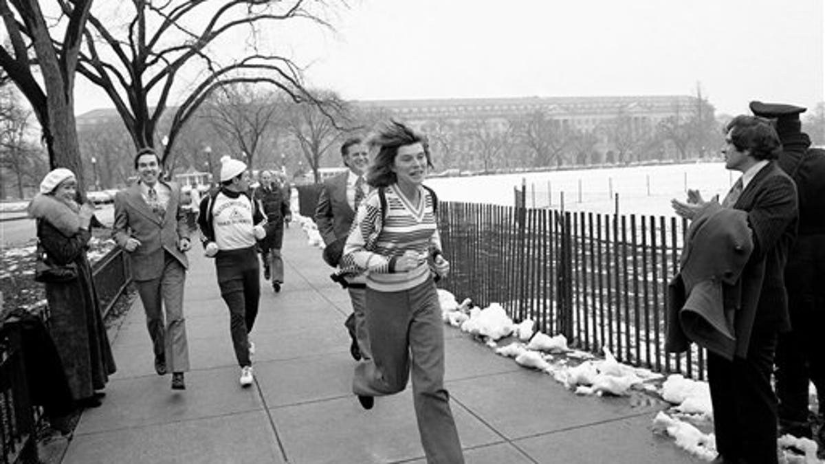 Sen. Edward M. Kennedy, D-Mass, and his sister, Eunice Shriver, jogged and walked a mile on the Ellipse Thursday, Feb. 6, 1975 in Washington to kick off a 3,182-mile fund-raising jaunt for the benefit of the Special Olympics sports program for mentally challenged youngsters. (AP Photo/BD)