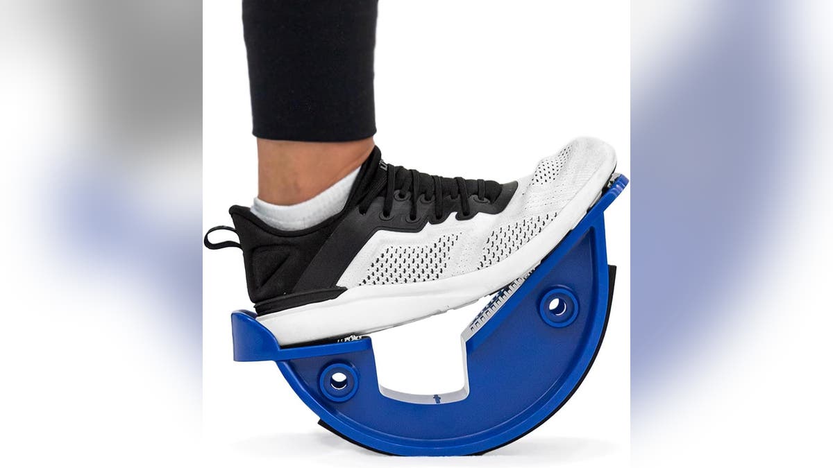 Stretch your ankles with the help of a foot rocker.