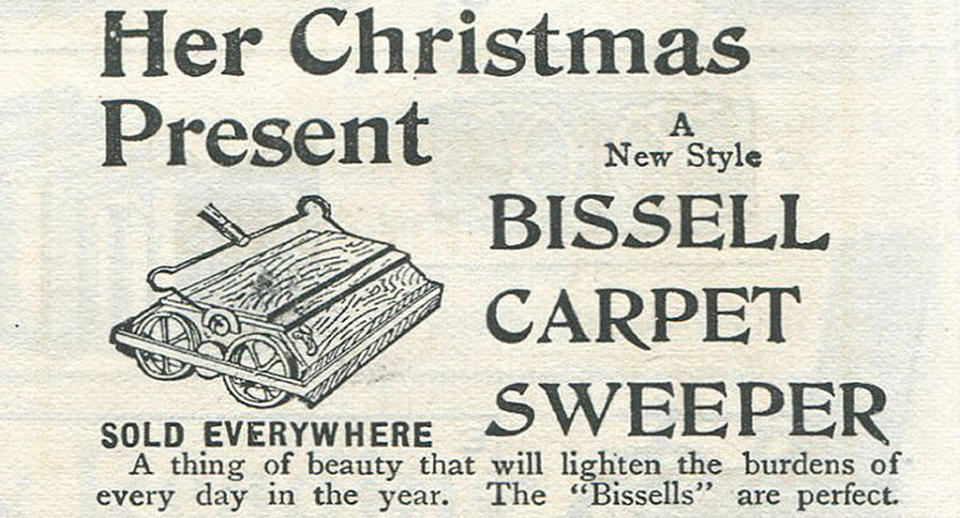 Vintage advertisement for a Bissell carpet sweeper, highlighting it as a perfect Christmas present that "lightens the burdens of every day in the year."