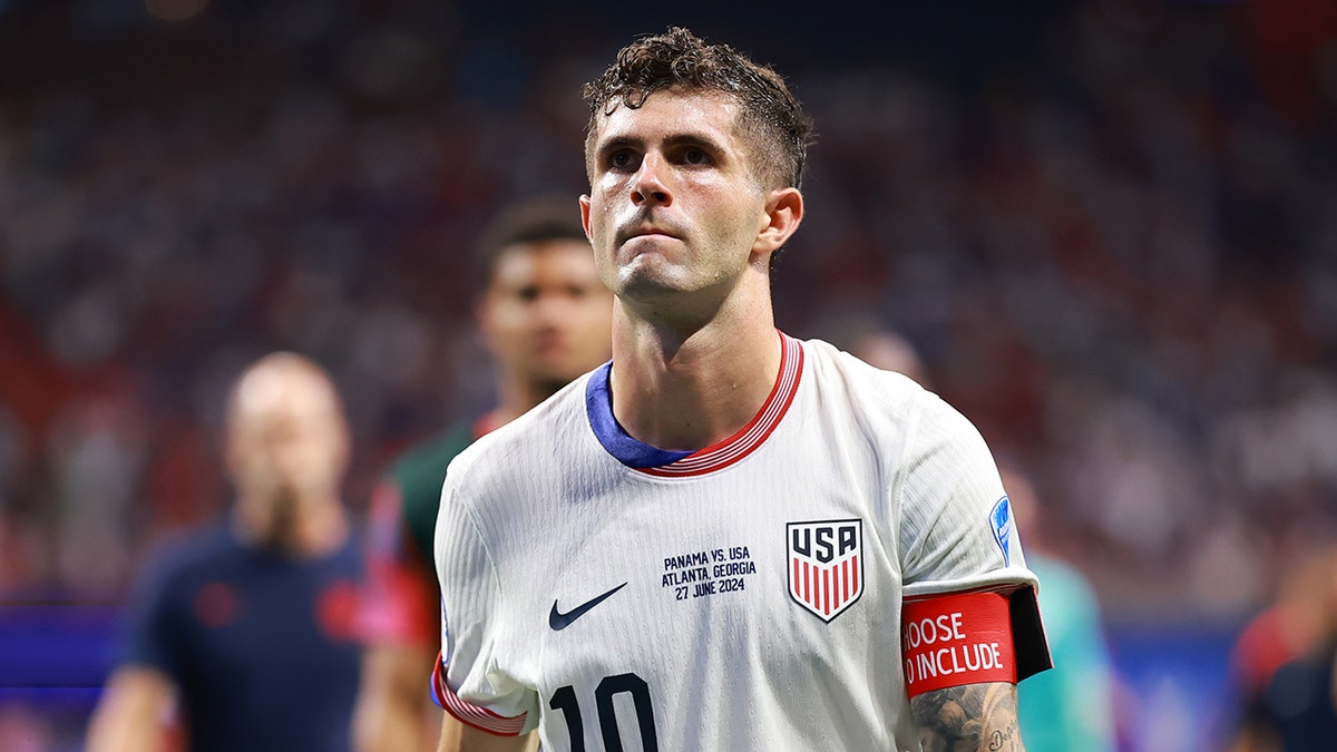 Christian Pulisic walks on field