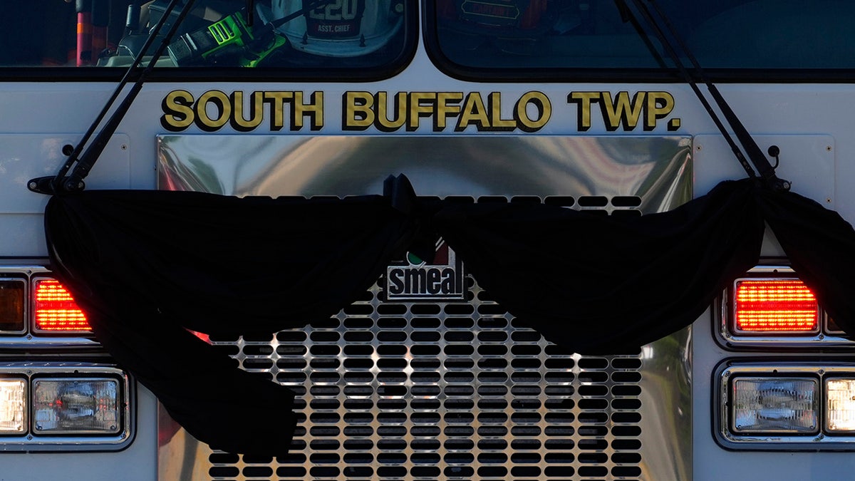 The funeral procession for Corey Comperatore passes