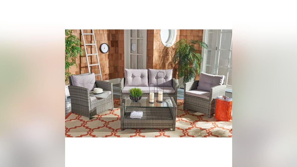 Lounge comfortably outside with a patio furniture set.
