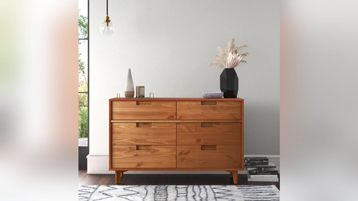 Complete your room with this beautiful wood dresser.
