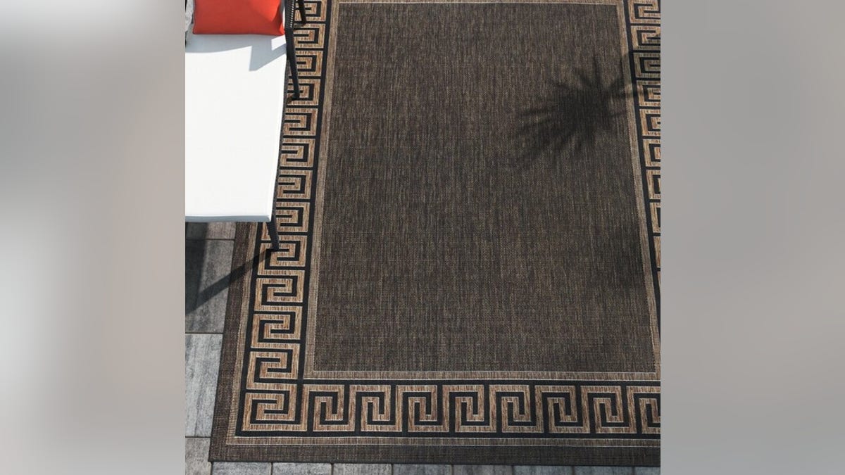 Make your patio more relaxing with an outdoor rug.