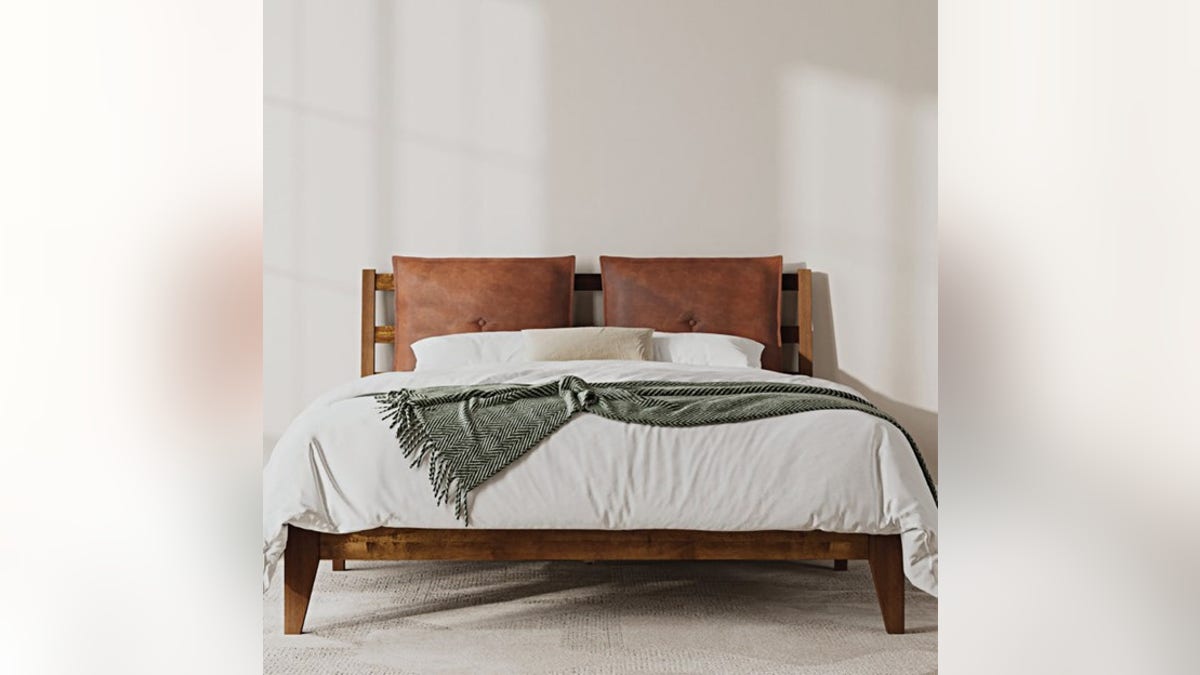 Sleep in style with this wood bed frame.