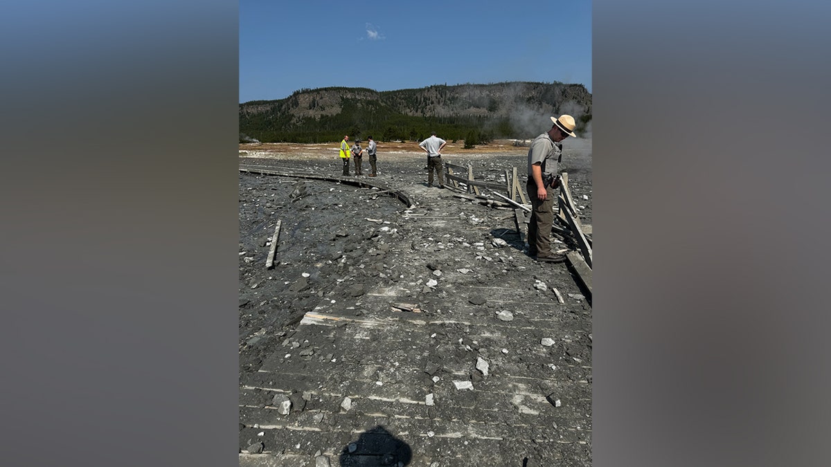 Yellowstone park rangers examine rubble from explosion
