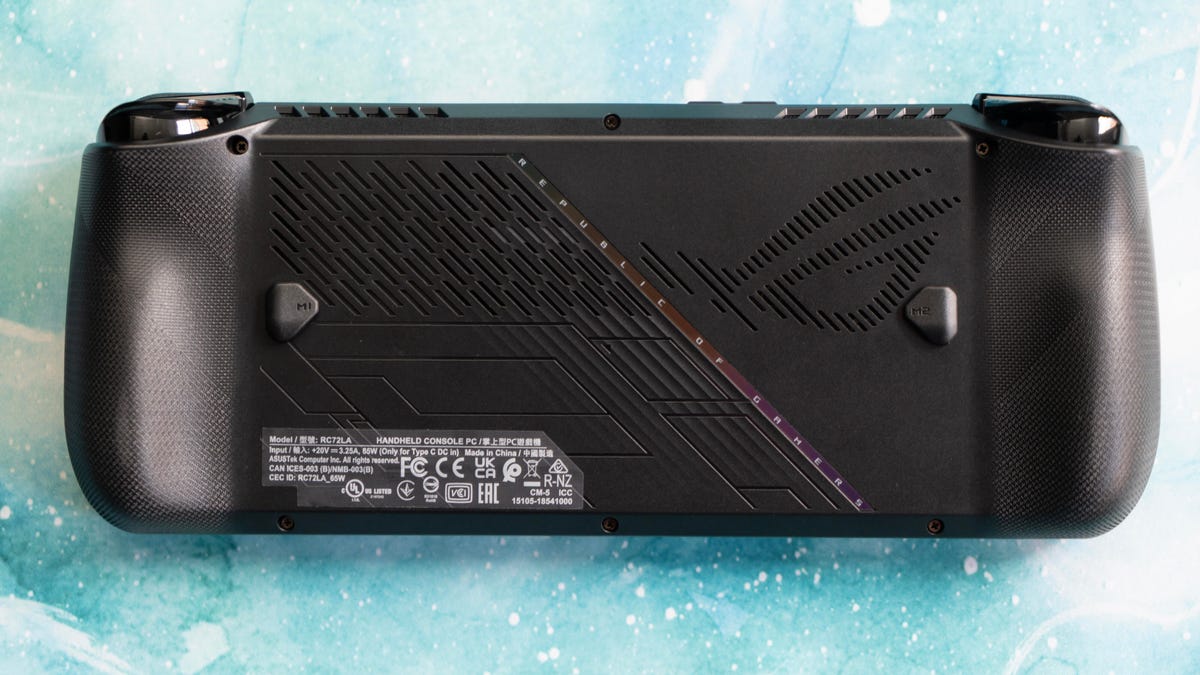 The back of the Ally X showing the paddles, lying on a turquoise marbled background