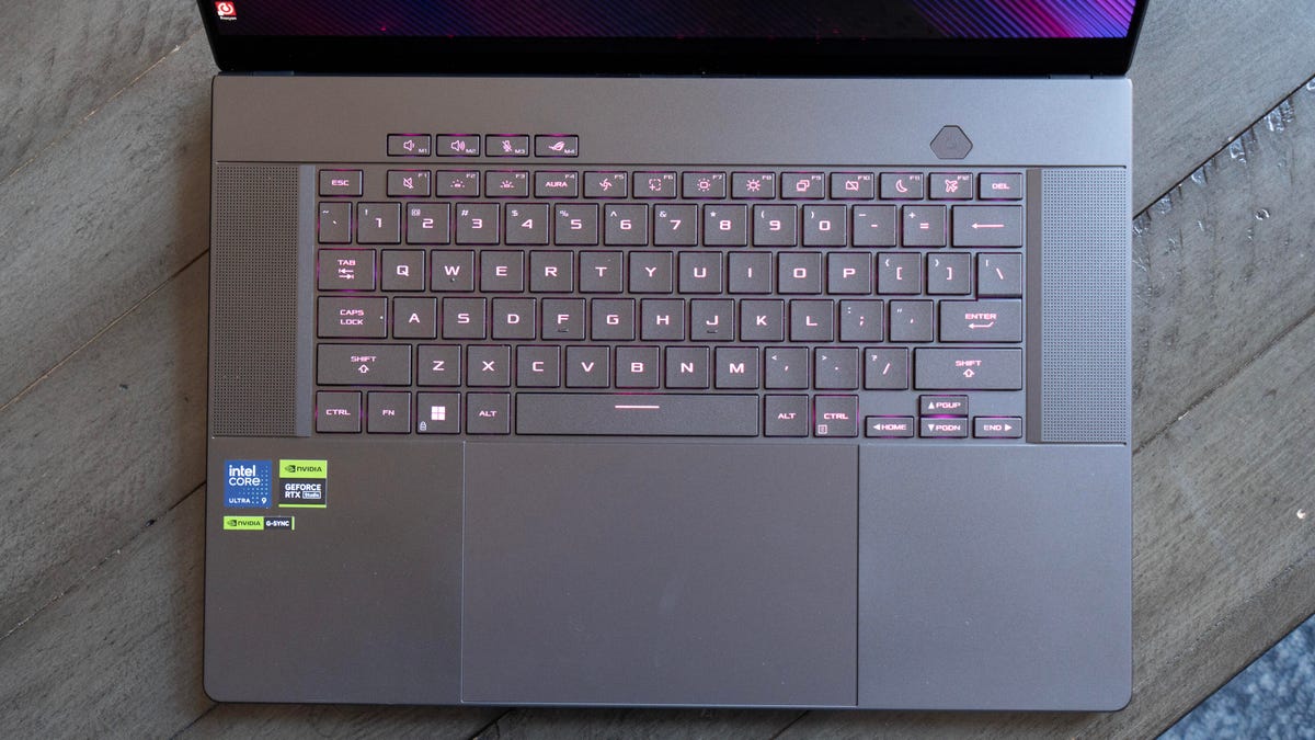 A top-down view of the opened laptop showing the keyboard