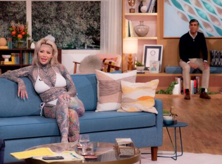 UK prime minister awkwardly makes TV appearance after bikini-clad OnlyFans model on eve of election