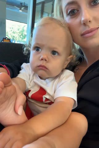 <p>Brittany Mahomes/Instagram</p> Brittany Mahomes holds her son Bronze