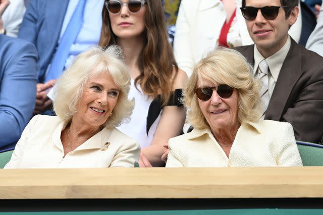 <p>Karwai Tang/WireImage</p> Queen Camilla and Annabel Elliot ttend day ten of the Wimbledon Tennis Championships at the All England Lawn Tennis and Croquet Club on July 10, 2024.