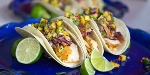 Blackened Fish Tacos with Bourbon-Bacon Slaw and Peach Salsa