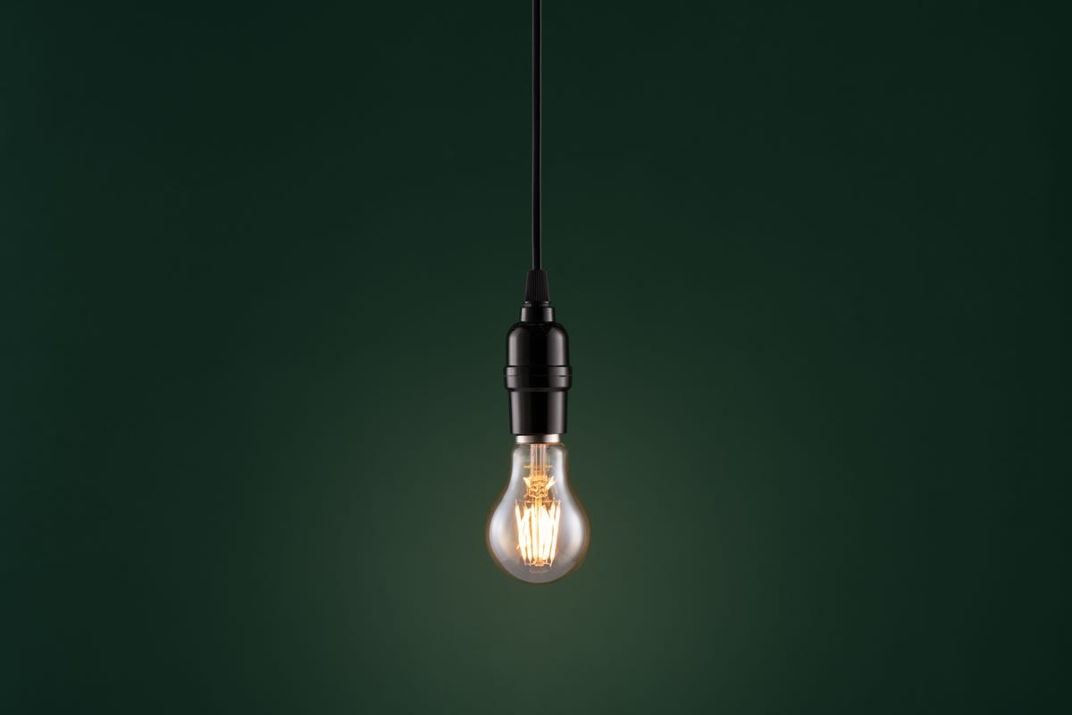 single lightbulb turned on