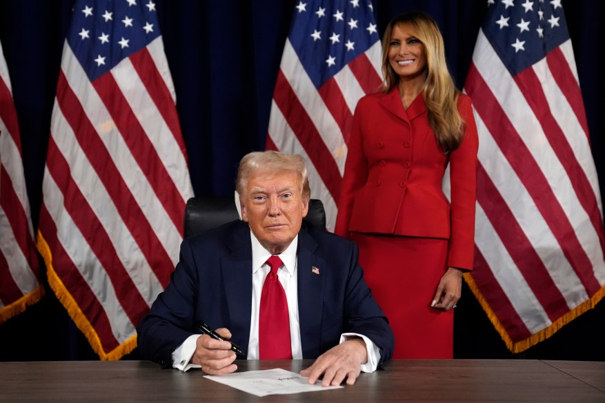 Donald Trump signs paperwork to officially accept the nomination during the final day of the Republican National Convention at the Fiserv Forum, Thursday, July 18, 2024, in Milwaukee.