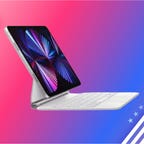 apple keyboard on stand against red white and blue gradient and red and blue stripes