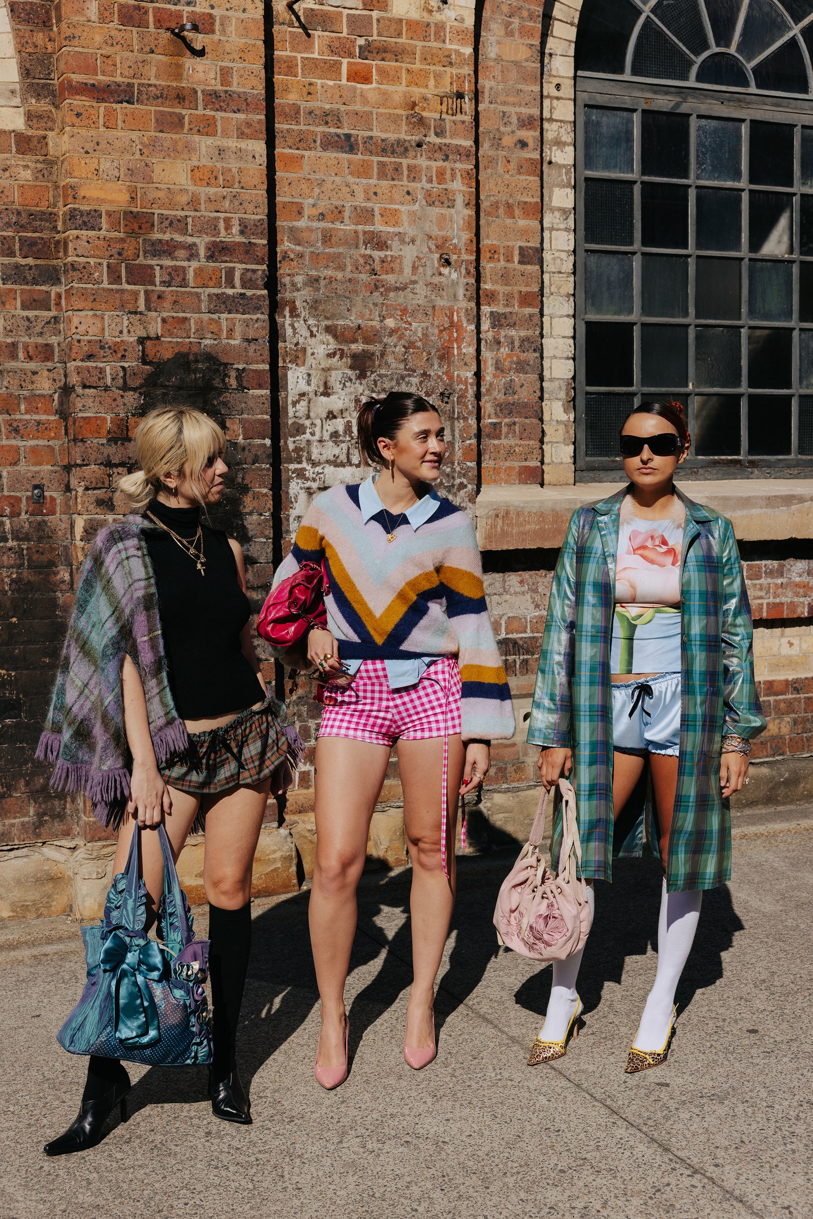 Image may contain Clothing Shorts Accessories Bag Handbag Footwear High Heel Shoe Person Teen Adult and Glasses