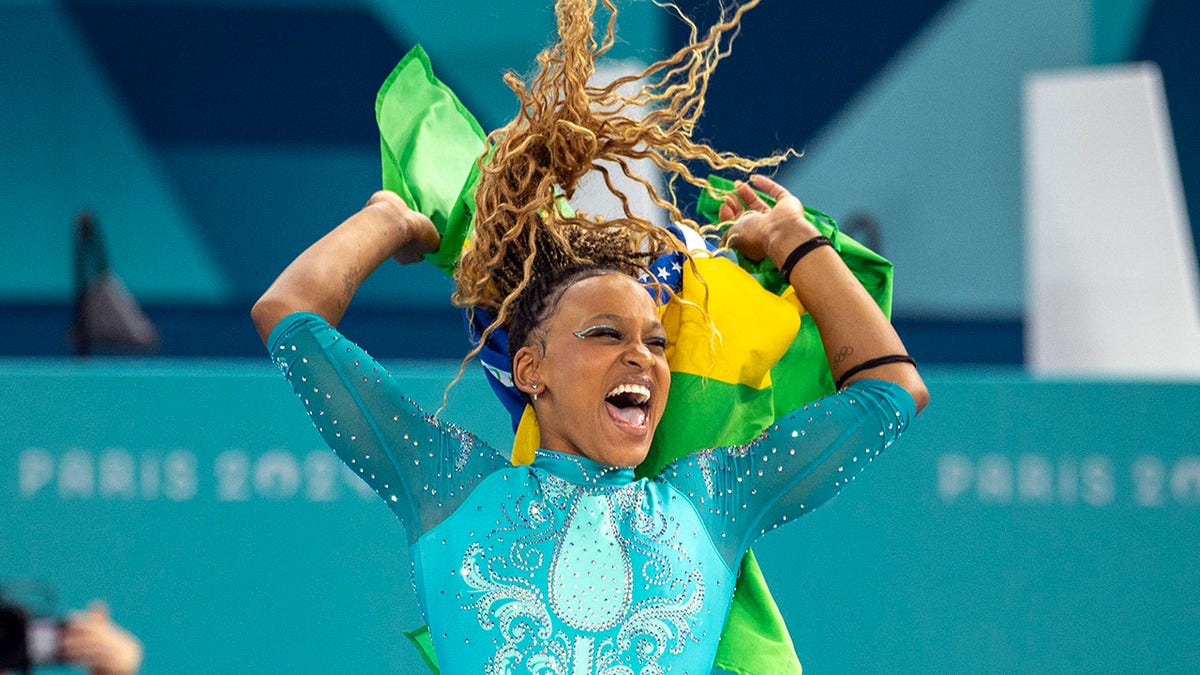 Rebeca Andrade celebrates gold