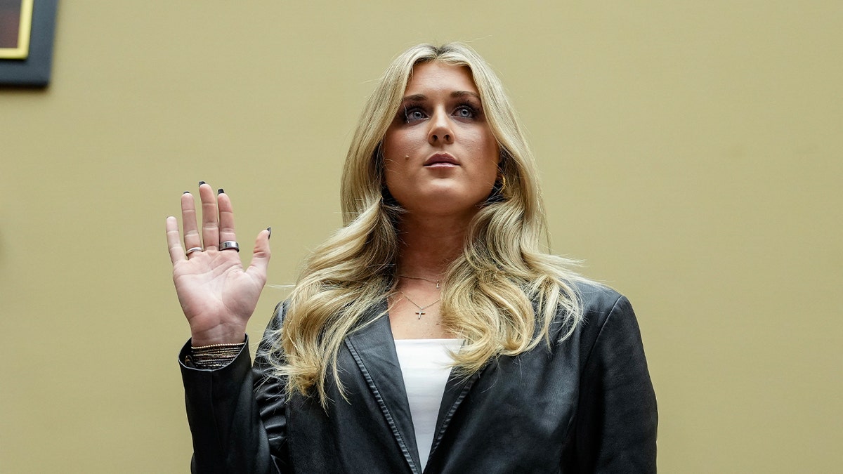 Former collegiate swimmer Riley Gaines is sworn in during a House Oversight Subcommittee on Health Care and Financial Services hearing on Capitol Hill Dec. 5, 2023 in Washington, DC.