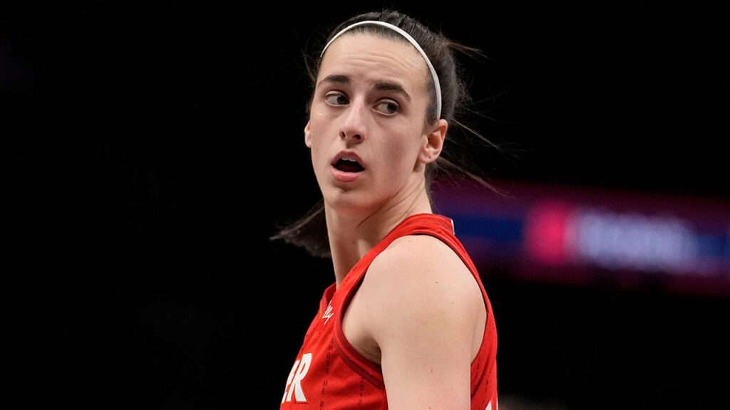 Fever’s Caitlin Clark battles through tweaked ankle to tie WNBA rookie record in win over Dream